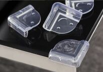 ZABEZPIECZENIE OSŁONKI SILIKONOWE NAROŻNIKÓW ROGÓW MEBLI STOŁU OSŁONA NA NAROŻNIKI KANTY OSTRE BRZEGI 4SZT - 4